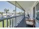 Relaxing screened porch with seating and view of the community at 1140 S Orlando Ave # F-16, Maitland, FL 32751