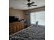 Primary bedroom with king-size bed and pool view at 1461 N Felton St, Deltona, FL 32725