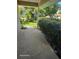 Covered front porch with a view of the nicely landscaped yard at 1461 N Felton St, Deltona, FL 32725