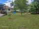 Spacious backyard with mature trees and plenty of open space at 1461 N Felton St, Deltona, FL 32725
