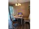 Charming dining area with a table and four chairs at 1461 N Felton St, Deltona, FL 32725