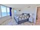 Main bedroom with ocean views and tiled floors at 2625 S Atlantic Ave # 24Nw, Daytona Beach, FL 32118