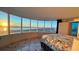 Bedroom offering breathtaking sunset views over the water at 2625 S Atlantic Ave # 24Nw, Daytona Beach, FL 32118