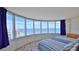 Bright bedroom with ocean views and two twin-size beds at 2625 S Atlantic Ave # 24Nw, Daytona Beach, FL 32118