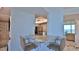 Kitchenette with granite countertop and seating for two at 2625 S Atlantic Ave # 24Nw, Daytona Beach, FL 32118