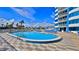 Inviting resort-style pool with comfortable lounge chairs at 2625 S Atlantic Ave # 24Nw, Daytona Beach, FL 32118