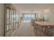 Living room with a view, light-colored carpet, and comfy seating at 4 Oceans West Blvd # 407B, Daytona Beach Shores, FL 32118