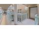 Interior hallway with access to unit 107 at 4 Oceans West Blvd # 407B, Daytona Beach Shores, FL 32118