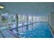 Indoor heated pool with seating area at 4 Oceans West Blvd # 407B, Daytona Beach Shores, FL 32118