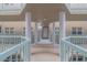 Interior hallway with access to unit 107 at 4 Oceans West Blvd # 407B, Daytona Beach Shores, FL 32118