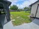 Large backyard with grassy area at 869 Roberts Blvd, Deltona, FL 32725