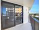 Balcony with sliding glass doors and an ocean view at 1415 Ocean Shore Blvd # 303, Ormond Beach, FL 32176