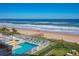 Communal pool area with beach access at 1415 Ocean Shore Blvd # 303, Ormond Beach, FL 32176