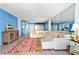 Open living area with ocean view and comfortable seating at 1415 Ocean Shore Blvd # 303, Ormond Beach, FL 32176