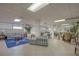 Community room with seating, tables, and chairs at 1415 Ocean Shore Blvd # 303, Ormond Beach, FL 32176