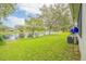 Peaceful backyard oasis overlooking a tranquil lake at 316 Dahoon Holly Dr, Daytona Beach, FL 32117