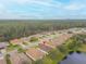 Aerial view highlighting home's location near water at 316 Dahoon Holly Dr, Daytona Beach, FL 32117