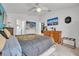 Bright main bedroom with a comfortable bed and dresser at 316 Dahoon Holly Dr, Daytona Beach, FL 32117