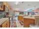 Open kitchen with ample cabinetry and breakfast bar at 316 Dahoon Holly Dr, Daytona Beach, FL 32117