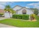 Charming single-story home with landscaped lawn at 316 Dahoon Holly Dr, Daytona Beach, FL 32117