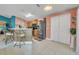 Kitchen with wood cabinets, stainless steel appliances, and an island at 316 Dahoon Holly Dr, Daytona Beach, FL 32117