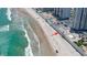 Aerial view of beachfront property with pool access at 2987 S Atlantic Ave # D060, Daytona Beach, FL 32118