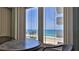 Ocean view from a condo with a table and chairs at 2987 S Atlantic Ave # D060, Daytona Beach, FL 32118
