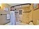 Updated bathroom with tile shower and tub at 2987 S Atlantic Ave # D060, Daytona Beach, FL 32118