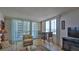 Living area with ocean view and wicker furniture at 2987 S Atlantic Ave # D060, Daytona Beach, FL 32118