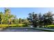 Peaceful pond view with lush greenery and white ibis birds at 1630 Primo Ct, Daytona Beach, FL 32117