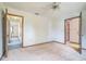 Spacious bedroom with access to bathroom and hallway at 10170 Sw 96Th Ct, Ocala, FL 34481