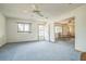 Bright living room with an open concept floor plan, and view of the dining area at 10170 Sw 96Th Ct, Ocala, FL 34481
