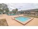 Relaxing pool and spa area with lounge chairs and fencing at 10170 Sw 96Th Ct, Ocala, FL 34481