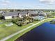 Community center with pool, landscaping, and outdoor games at 4345 Heath Land Ln, Lake Wales, FL 33859