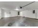 Attached garage with extra storage space and utility hookups at 660 Saxon Blvd, Deltona, FL 32725
