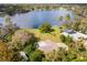Aerial view of house, highlighting its spacious lot and waterfront access at 660 Saxon Blvd, Deltona, FL 32725