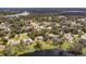 Aerial view showing home's location by the lake at 660 Saxon Blvd, Deltona, FL 32725