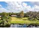 Aerial view of single-story home with large backyard and waterfront access at 660 Saxon Blvd, Deltona, FL 32725