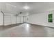 Spacious garage with automatic garage door opener at 660 Saxon Blvd, Deltona, FL 32725