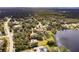 Aerial view showing home's location near water at 660 Saxon Blvd, Deltona, FL 32725