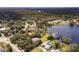 Aerial view showcasing home's waterfront lot at 660 Saxon Blvd, Deltona, FL 32725
