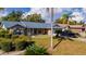 Brick house with attached garage and landscaping at 1020 Hanford Dr, Deltona, FL 32738