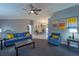 Bright and airy living room with comfy seating and a modern aesthetic at 1020 Hanford Dr, Deltona, FL 32738