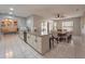 Open concept kitchen with island and adjacent dining area at 1020 Hanford Dr, Deltona, FL 32738