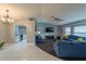 Open living room and kitchen with tile floors at 1020 Hanford Dr, Deltona, FL 32738
