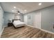 Spacious bedroom with wood-look floors and plenty of closet space at 1020 Hanford Dr, Deltona, FL 32738