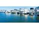 Boats docked at a marina on a sunny day at 4650 Links Village Dr # C303, Ponce Inlet, FL 32127