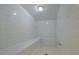 Clean and spacious steam room with tiled walls at 4650 Links Village Dr # C303, Ponce Inlet, FL 32127