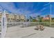 Community boardwalk with seating overlooking marina at 4650 Links Village Dr # C303, Ponce Inlet, FL 32127