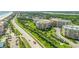 Aerial view of building and surrounding area at 4650 Links Village Dr # C303, Ponce Inlet, FL 32127